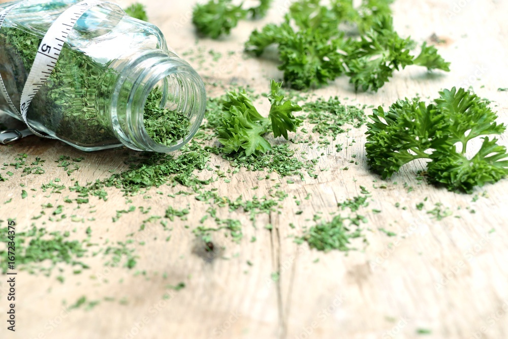 Dried herb parsley leaves - obrazy, fototapety, plakaty 