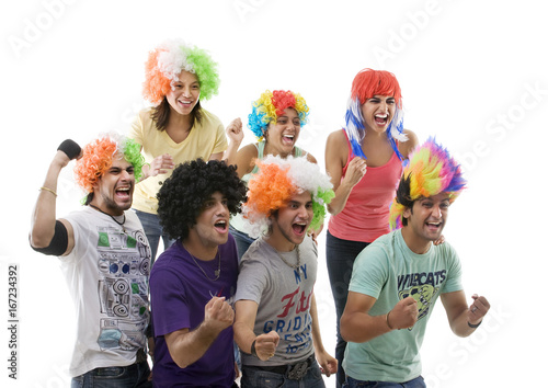Youngsters with wigs cheering 