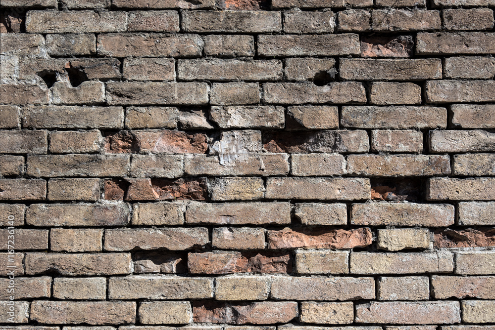 Obraz premium Old broken brick wall