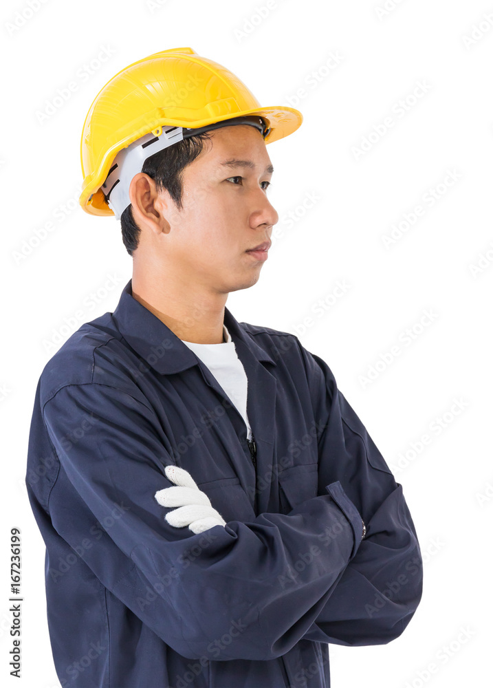 Young worker standing with arm crossed