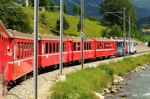 Switzerland:July 2012, Swiss mountain Red Train Bernina Express from Tirano (Italy) to St. Moritz (Switzerland). 