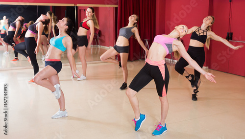 Portrait of young fitness women dancing zumba