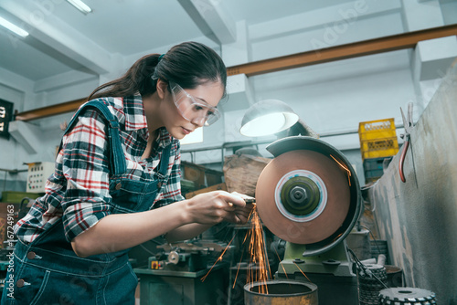 milling machining worker using abrasive wheel tool