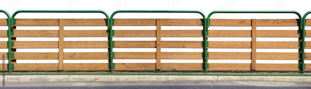 The fence of a small urban school stadium isolated The fence of a small urban school stadium isolated