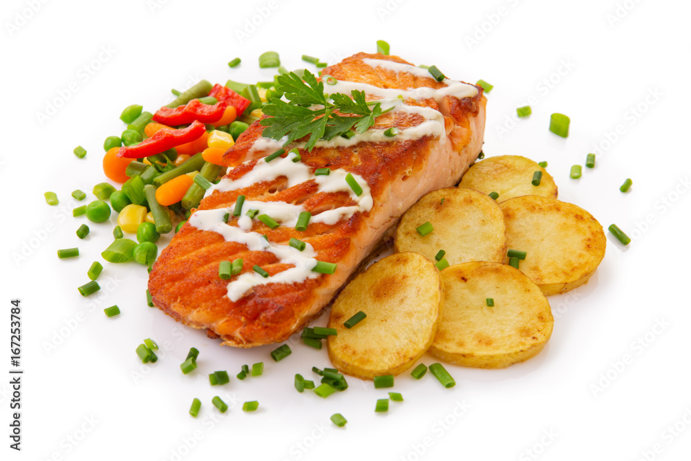 Salmon Steak with Vegetables and fried potatoes.