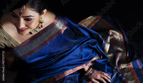 Woman in a blue saree 
