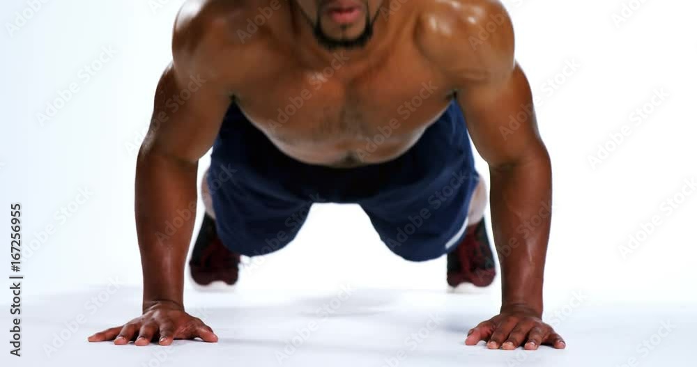 Fit man exercising on white background 4k
