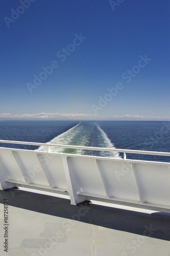 Eastern view of the Strait of Georgia from a ferry boat deck, British Columbia, Canada on a bright sunny day in May.