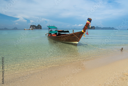 Long-tail Taxi boat on the beautiful beach, krabi, Thailand © warut