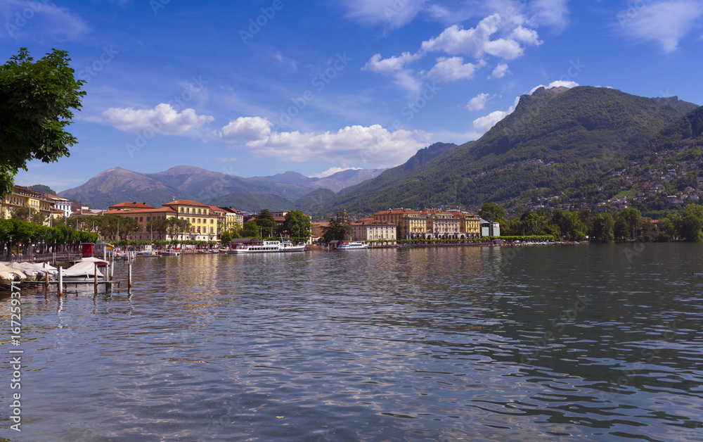 Naklejka premium The shipping pier and the Parco Ciani on the right at Lugano - Lugano, Lake Lugano, Lugano, Ticino, Switzerland, Europe