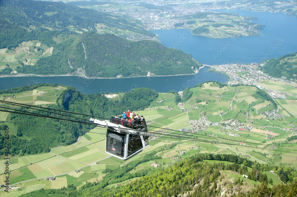 Stanserhorn Cabrio cable car. Stanserhorn Cabrio, the the world's first double deck open top cable car - obrazy, fototapety, plakaty 