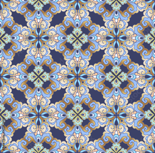 Eastern, Indian, Persian Golden seamless ornament on a blue background.Decorative ornament backdrop for fabric, textile, wrapping paper