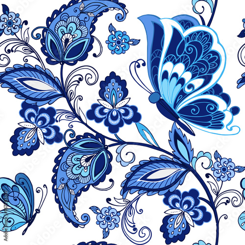 Traditional oriental seamless paisley pattern. Vintage flowers ornament with butterflies in blue colors. Decorative ornament backdrop for fabric, textile, wrapping paper