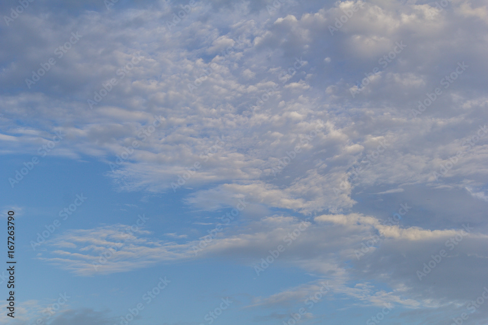 blue sky background with a tiny clouds