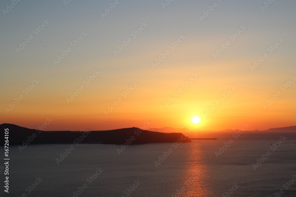 Golden Sunset View of the Ocean and Mountain Islands