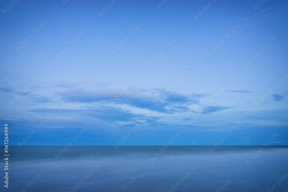 abstract clear sky and smooth sea on blue filter