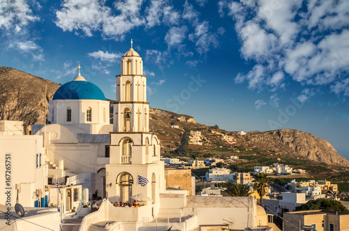 Pyrgos, Santorini island, Greece. Cycladic traditional village with blue domes of churches and white houses.
