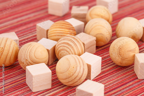 Wooden balls and cubes