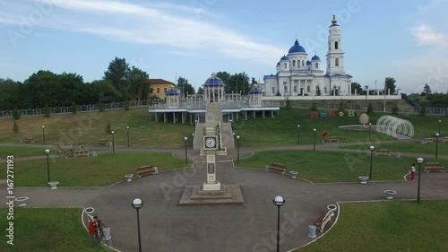 Flycam Moves from Clock and Shows Temple Complex Panorama photo