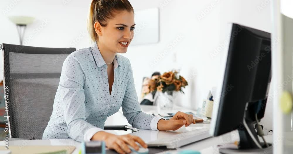 Businesswoman in front of computer in the office