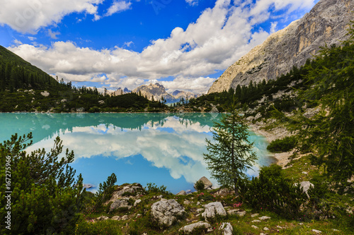 Lago di Sorapiss with amazing  turquoise color of water. The mountain lake in Dolomite Alps. Italy photo