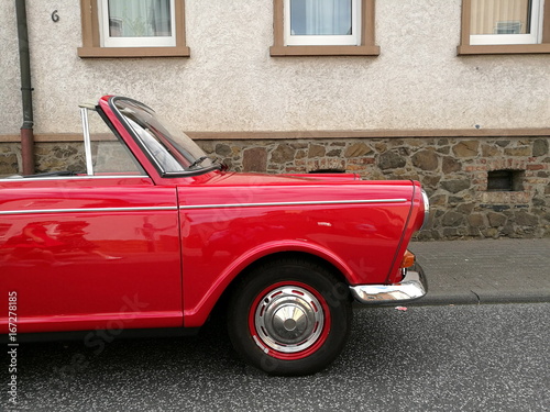 Offenes deutsches Dreizylinder Cabriolet der Sechziger Jahre in Rot beim Oldtimertreffen Golden Oldies in Wettenberg Krofdorf-Gleiberg bei Gießen in Hessen photo