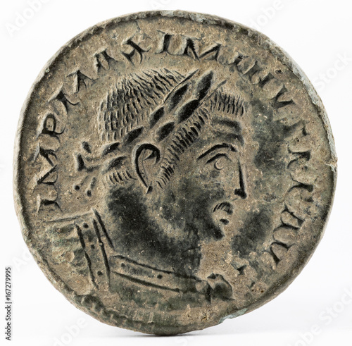 Ancient Roman copper coin of Galerius Maximianus. Obverse. photo