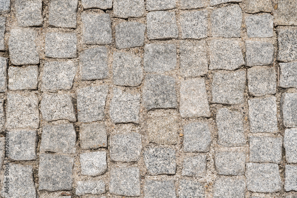 Fototapeta premium Kopfsteinpflasterung einer Straße - Nahaufnahme