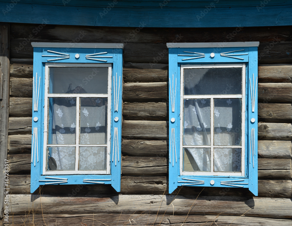 Fototapeta premium Old window in a wooden house