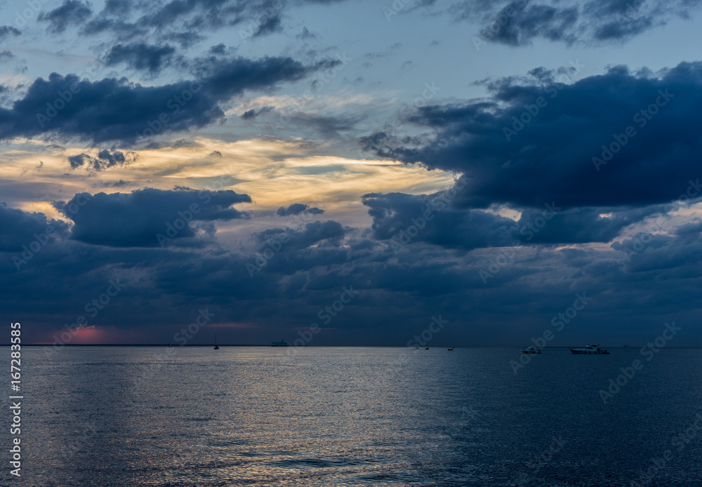 HDR image of Sunset over the Baltic Sea with big clouds HDR image of Sunset over the Baltic Sea with big clouds