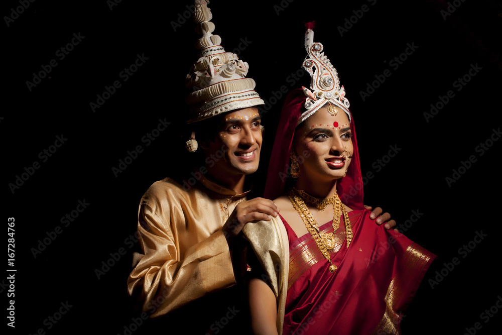 Bengali bride and groom thinking about the future 