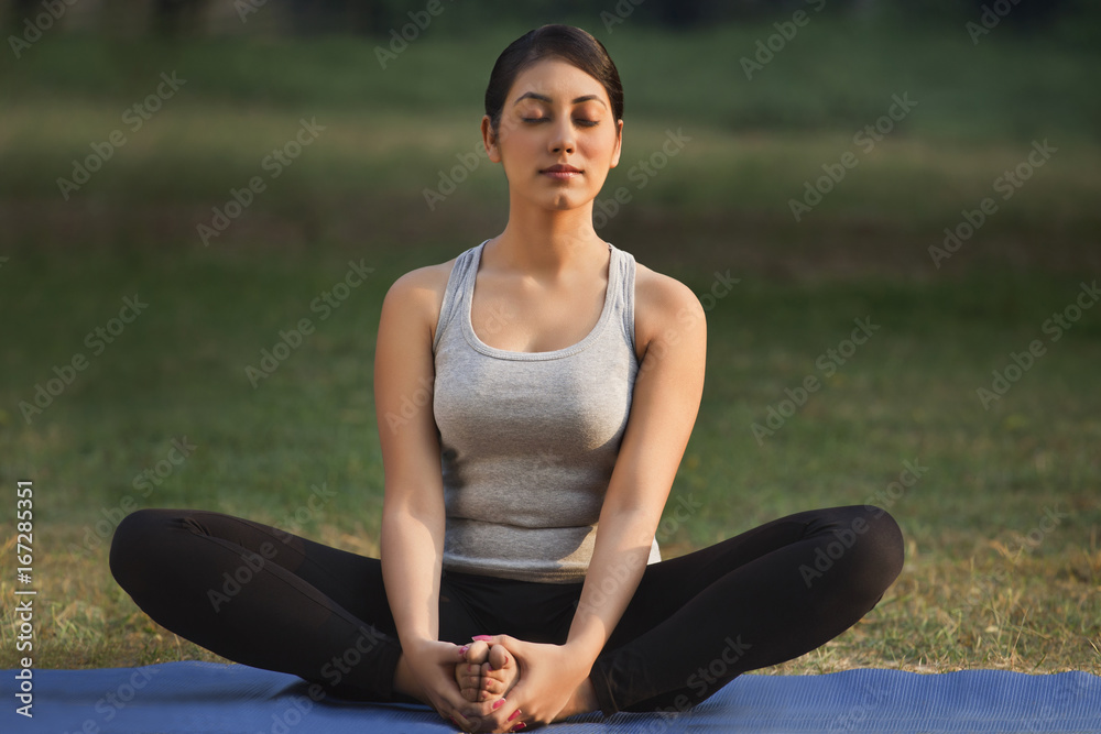 Young woman meditating Young woman meditating