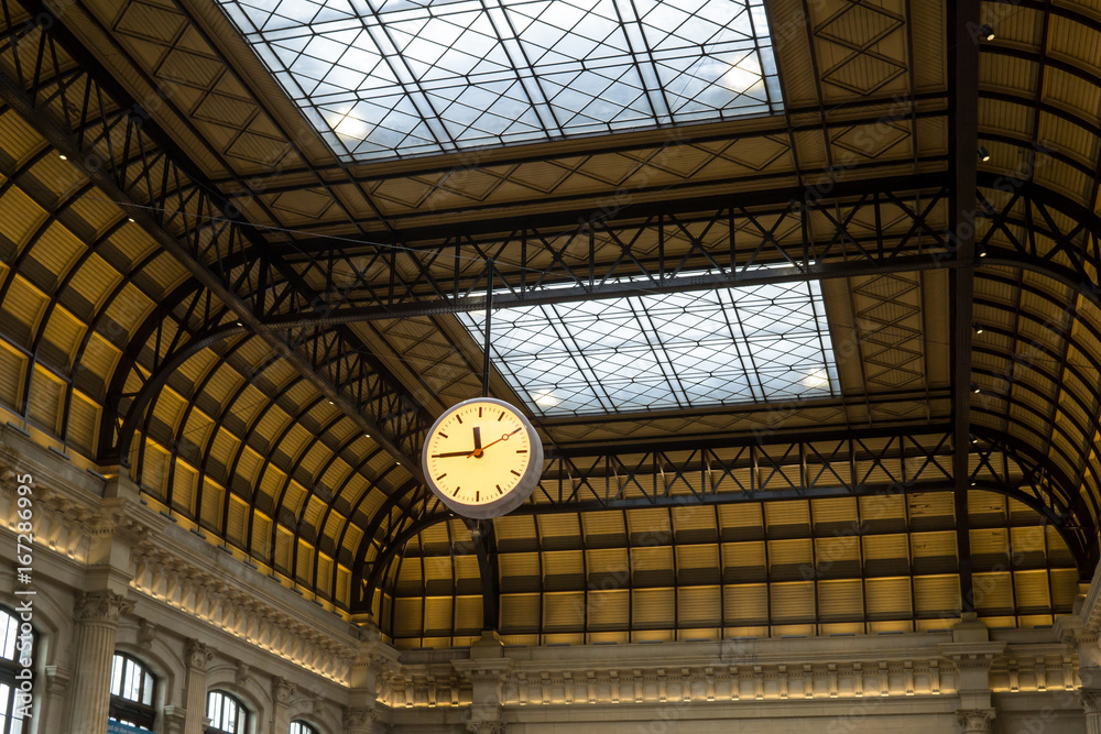 Giant clock in a train station, platform. time concept