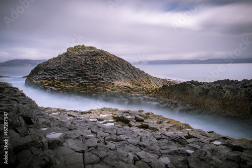 Fototapeta Long exposure seascape of basalt columns on the island of Staffa in the Inner He