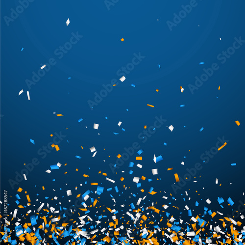 Blue background with colorful confetti. © Vjom