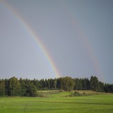 Regenbogen über Allgäuer Landschaft