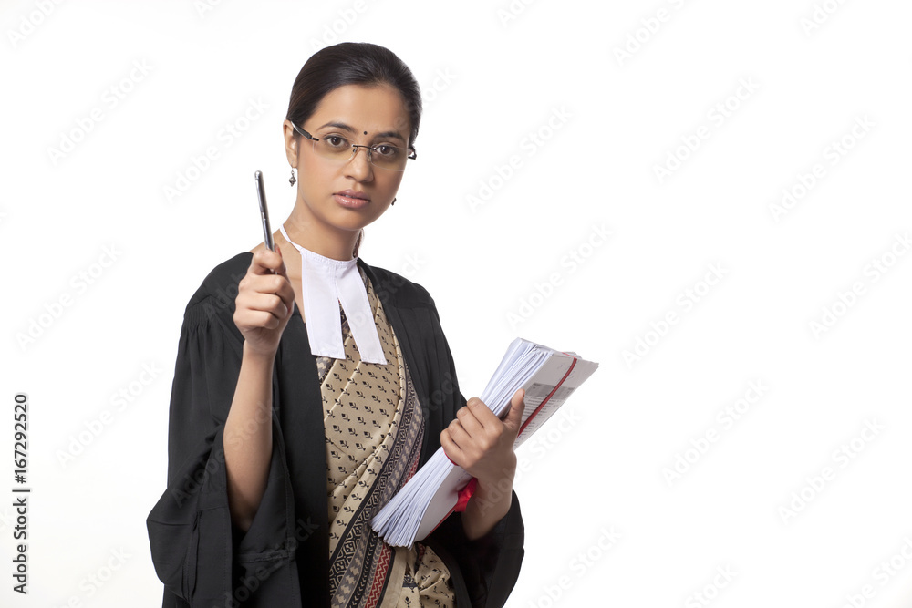 Portrait of young female lawyer holding pen and documents isolated over white background Portrait of young female lawyer holding pen and documents isolated over white background