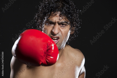 Close-up of young man punching  © IndiaPix