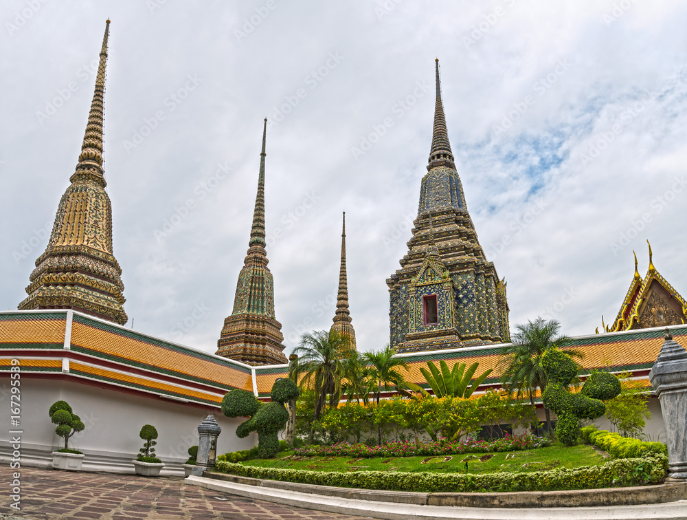 Low down view of Pagodas at Wat Pho temple, Bangkok. Low down view of Pagodas at Wat Pho temple, Bangkok.