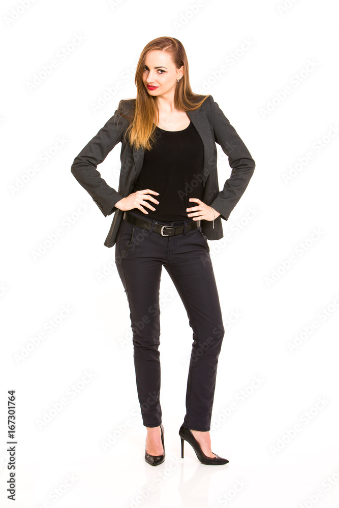 Dark blonde woman wearing smart casual outfit with hand on the hip on white background Dark blonde woman wearing smart casual outfit with hand on the hip on white background