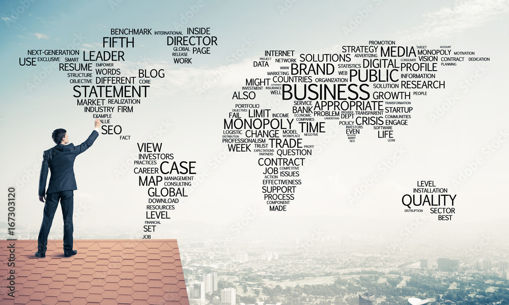 Businessman on brick roof draw world map as concept of globaliza Businessman on brick roof draw world map as concept of globaliza