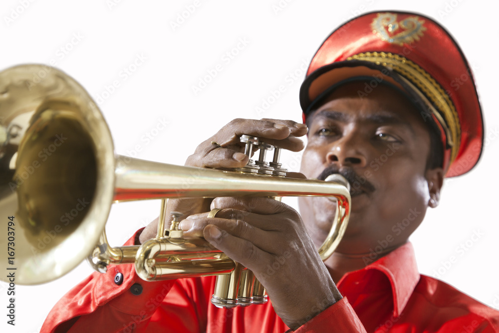 Close-up of bandmaster playing on a trumpet Stock Photo | Adobe Stock