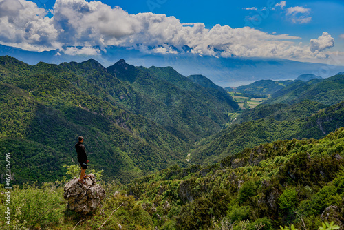 Cyclist athletes admiring the Garda Lake from Passo Tremalzo,Trails to Passo Tremalzo, Lago di Garda region, Italy, Italian Dolomites-panoramic views from the Tremalzo