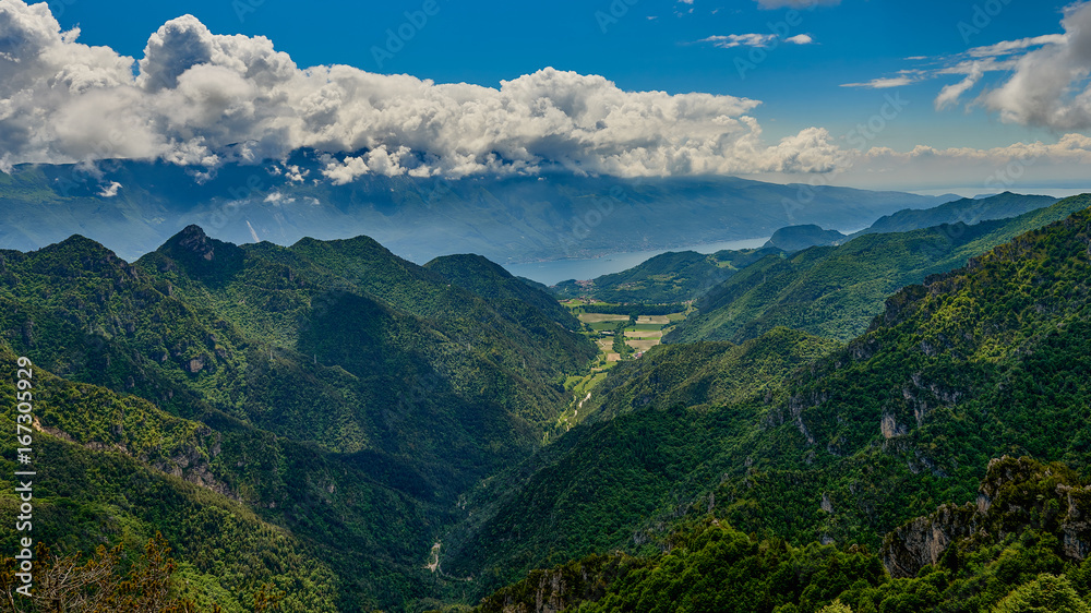 Obraz premium Beautiful landscape. View of Lake Garda from tremalzo pass ,Italy. Popular destinations for travel in Europe. Italian Dolomites-panoramic views from the Tremalzo mountains