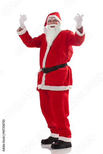 Full length of Santa Claus gesturing over white background 