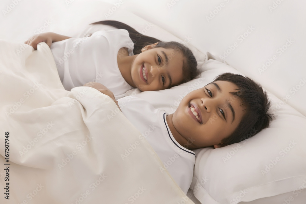 Brothar And Sistar Sleeping Xxx Video - Portrait of smiling brother and sister sleeping in bed Stock Photo | Adobe  Stock