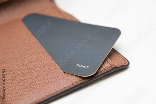 card in wallet on white background