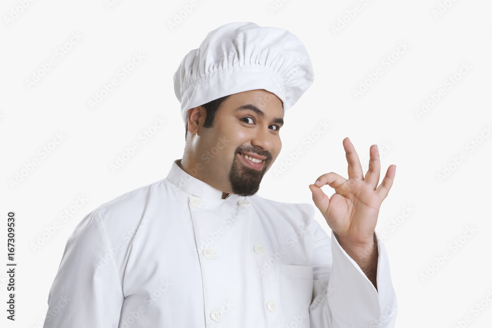 Portrait of chef giving ok hand gesture Portrait of chef giving ok hand gesture