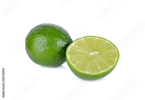 whole and half cut fresh lime on white background