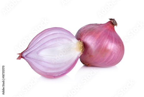 whole and half cut shallot on white background